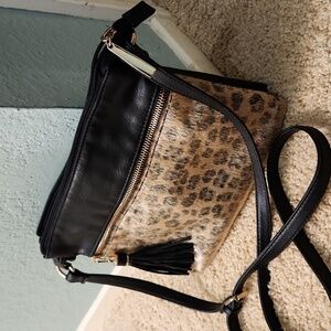 Faux leopard fur and black shaggy purse. 10"x8".